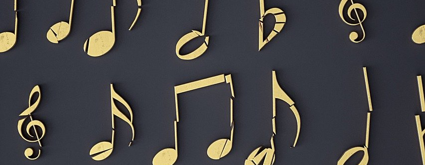 Grafik mit goldenen Notenzeichen auf dunklem Grund